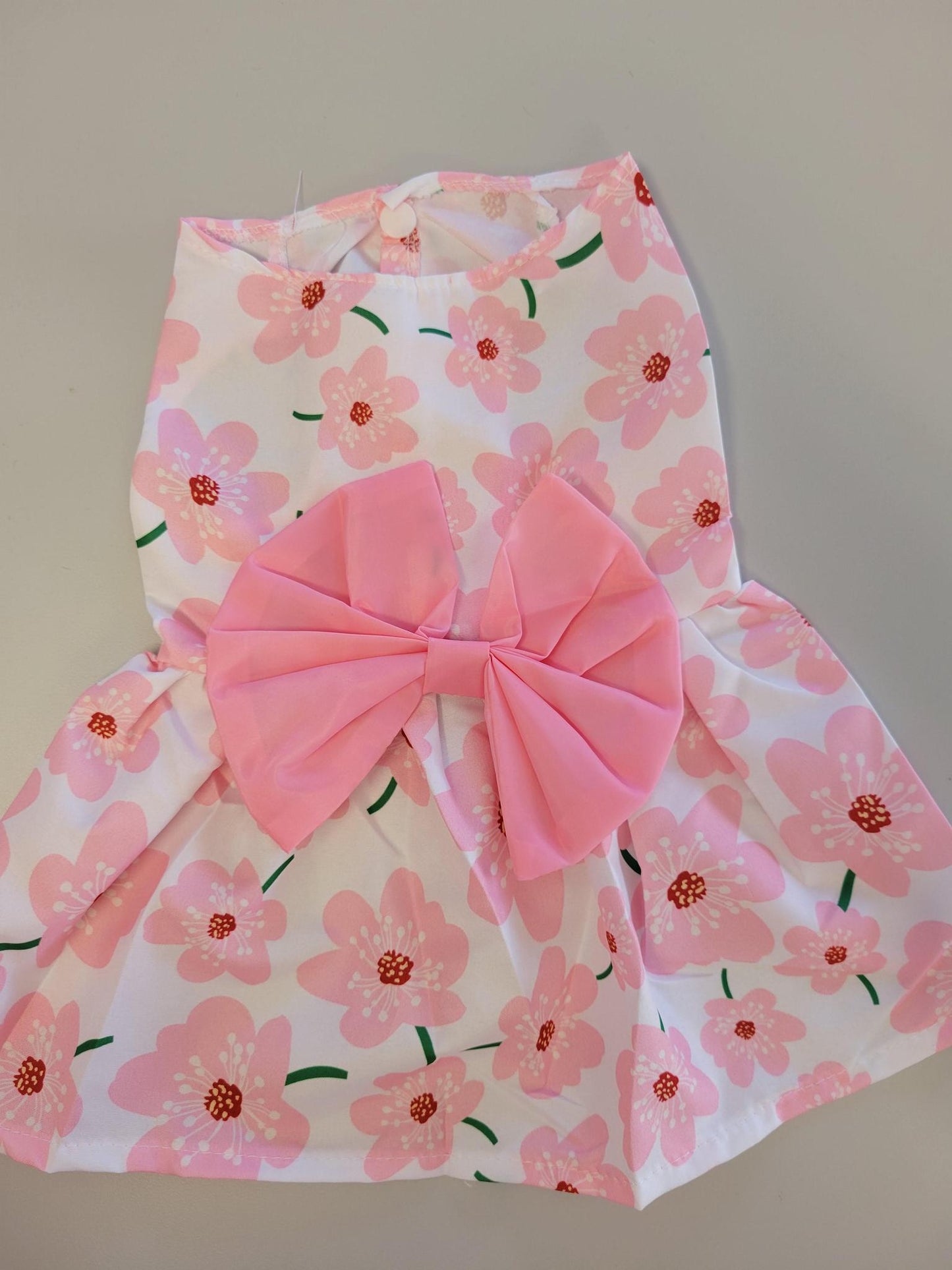 Floral dress with pink flowers with a pink bow