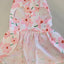 Floral dress with pink flowers with a pink bow