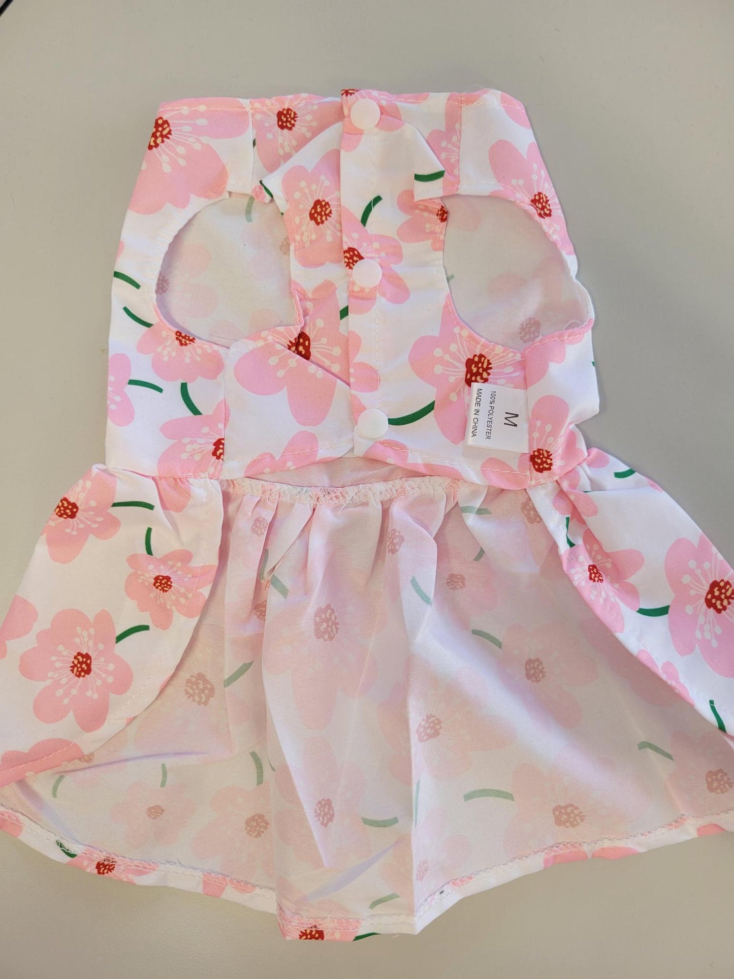 Floral dress with pink flowers with a pink bow
